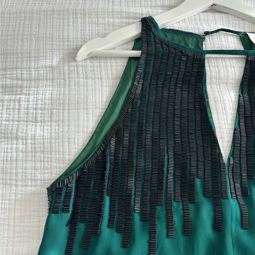 Parker Dark Emerald green sleeveless top with black Beaded detail.